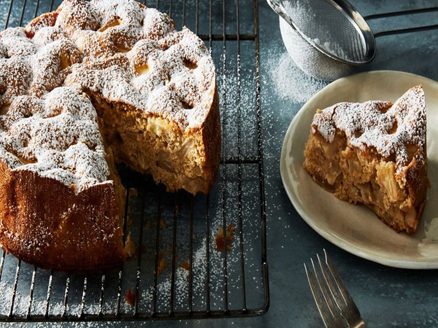 A freshly baked cake cooling on a wire rack